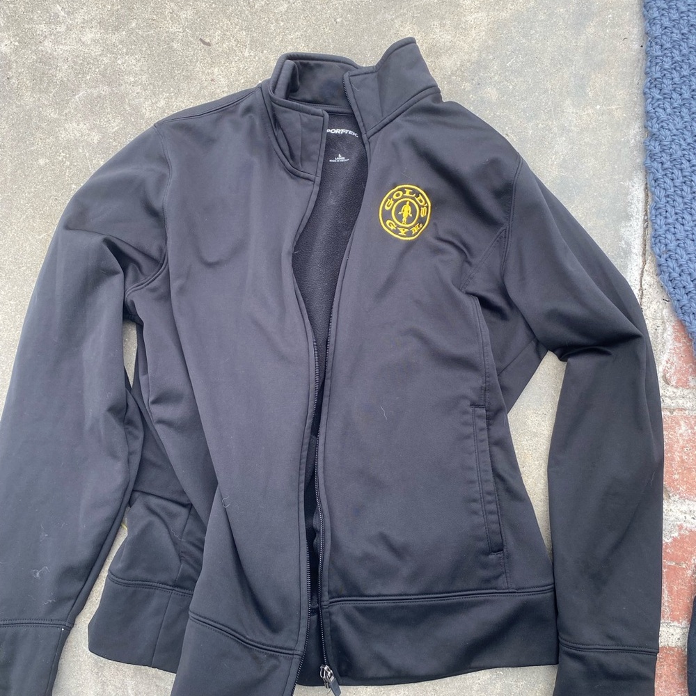 Black Bomber Jacket with Stand-Up Collar and Sleek Design